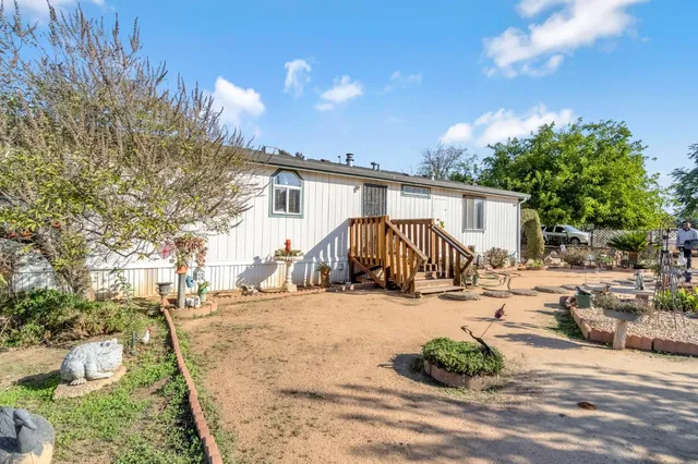 a view of a house with a patio