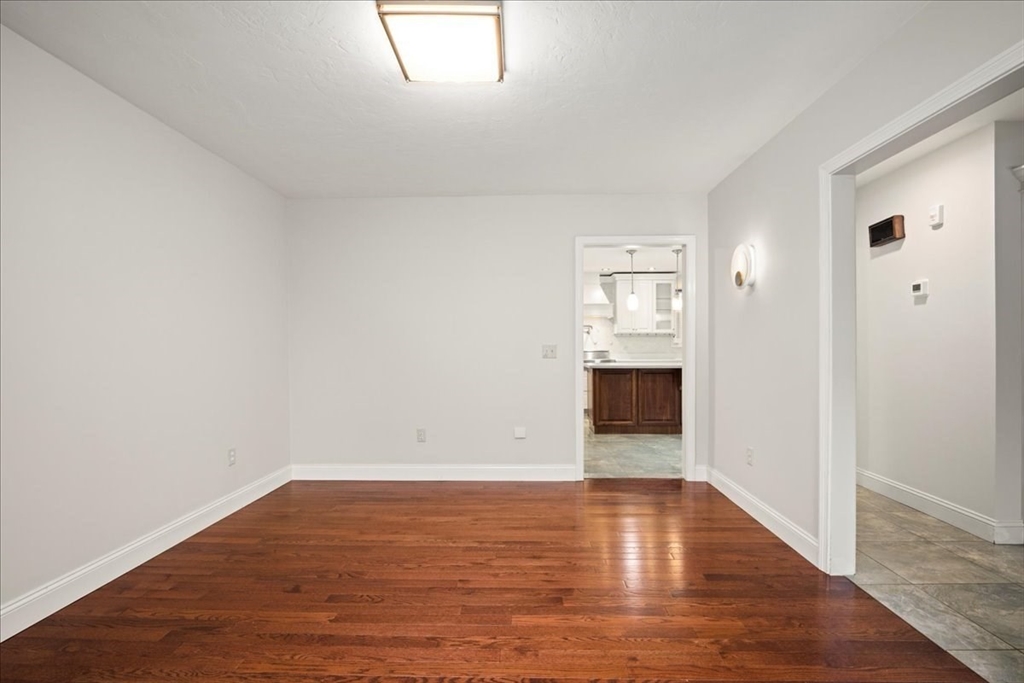 8 Arch Street Shrewsbury, MA 01545 - Photo 14 of 42 wooden floor in an empty room
