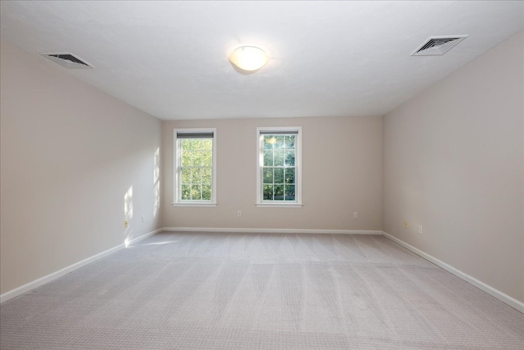 8 Arch Street Shrewsbury, MA 01545 - Photo 22 of 42 a view of room with window and hardwood floor