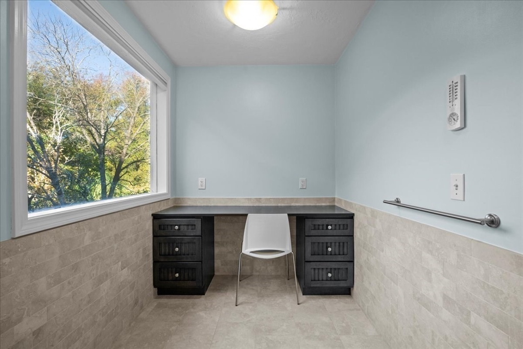 8 Arch Street Shrewsbury, MA 01545 - Photo 26 of 42 a view of an empty room with furniture and window