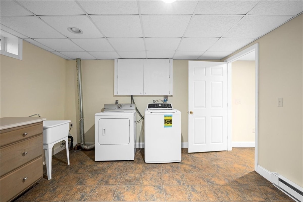 8 Arch Street Shrewsbury, MA 01545 - Photo 34 of 42 a utility room with dryer and washer