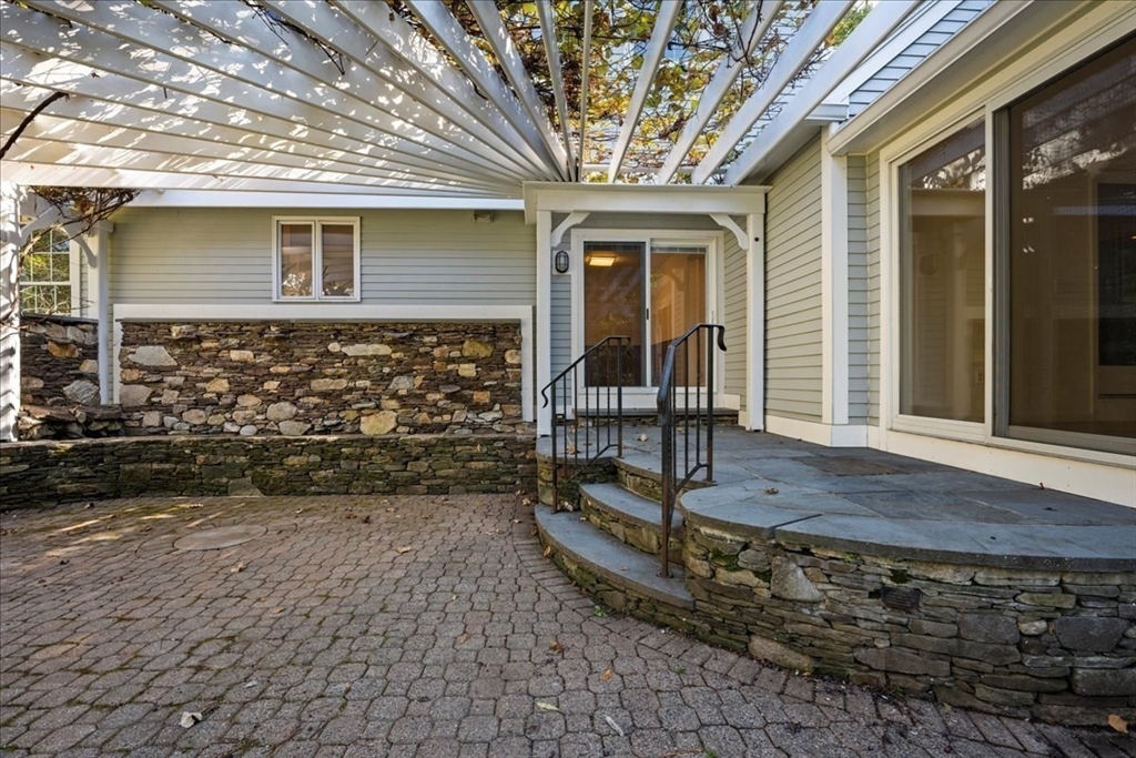 8 Arch Street Shrewsbury, MA 01545 - Photo 35 of 42 a view of house with wooden fence