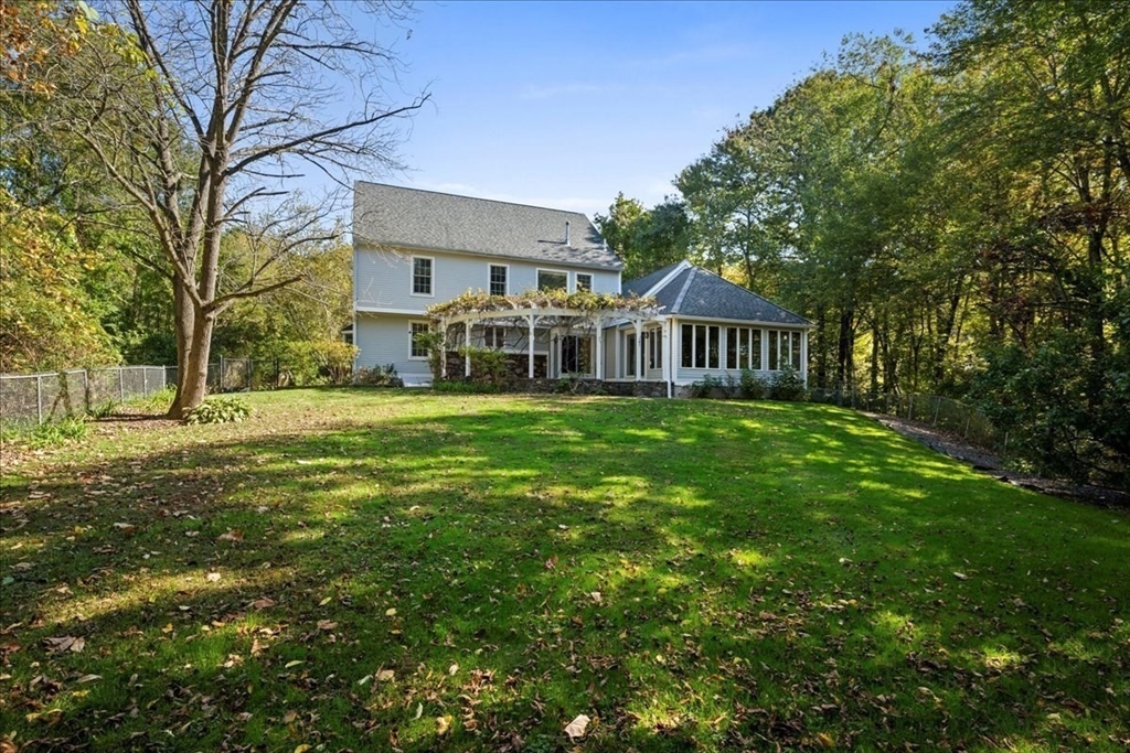 8 Arch Street Shrewsbury, MA 01545 - Photo 37 of 42 a view of a house with a yard