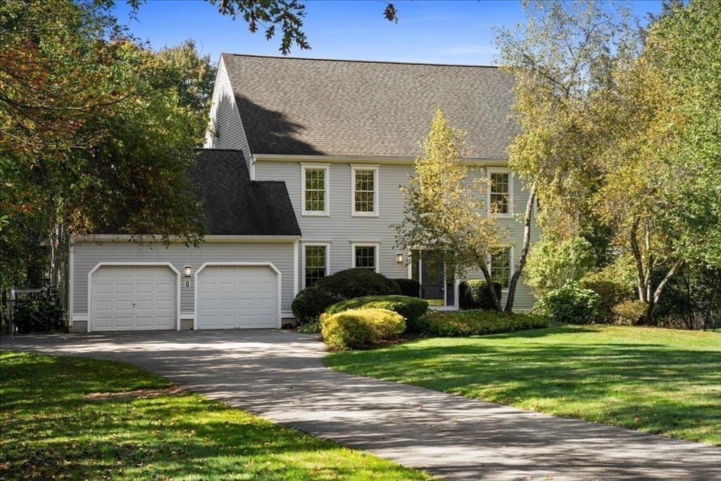 8 Arch Street Shrewsbury, MA 01545 - Photo 4 of 42 a house that has a big yard and large trees