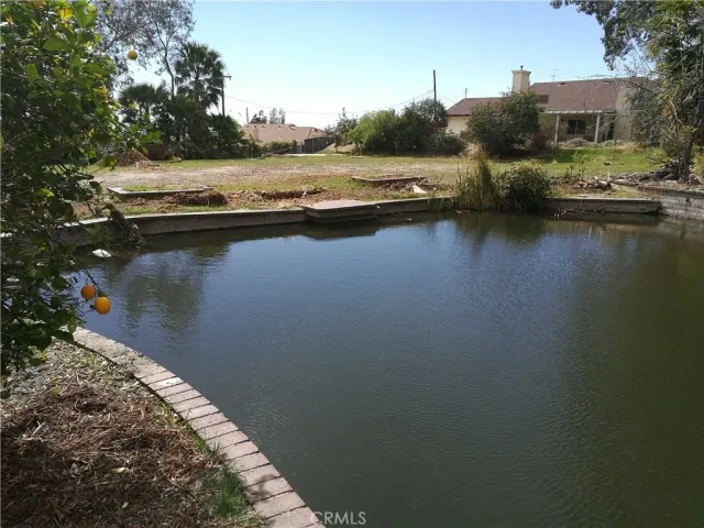 a view of a lake in middle of a house