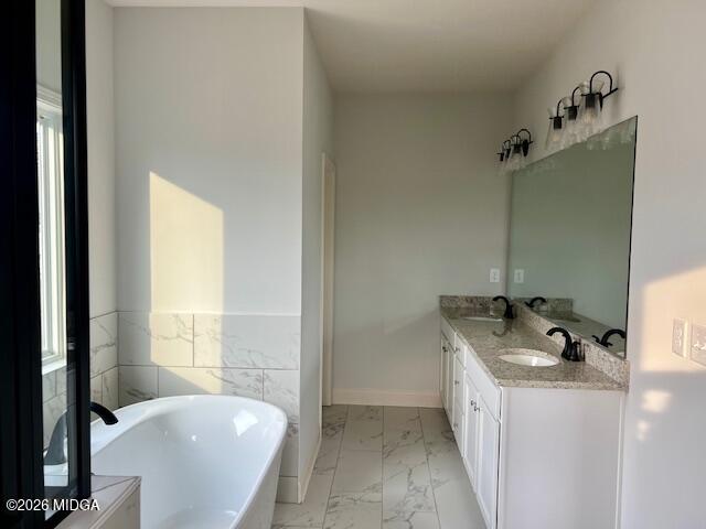204 Trellis Walk Macon, GA 31220 - Photo 16 of 27 a bathroom with a tub sink and mirror