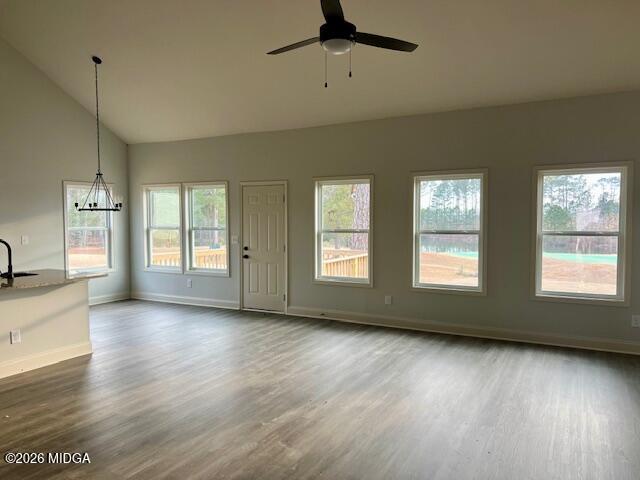 204 Trellis Walk Macon, GA 31220 - Photo 10 of 27 a view of an empty room with a window and wooden floor