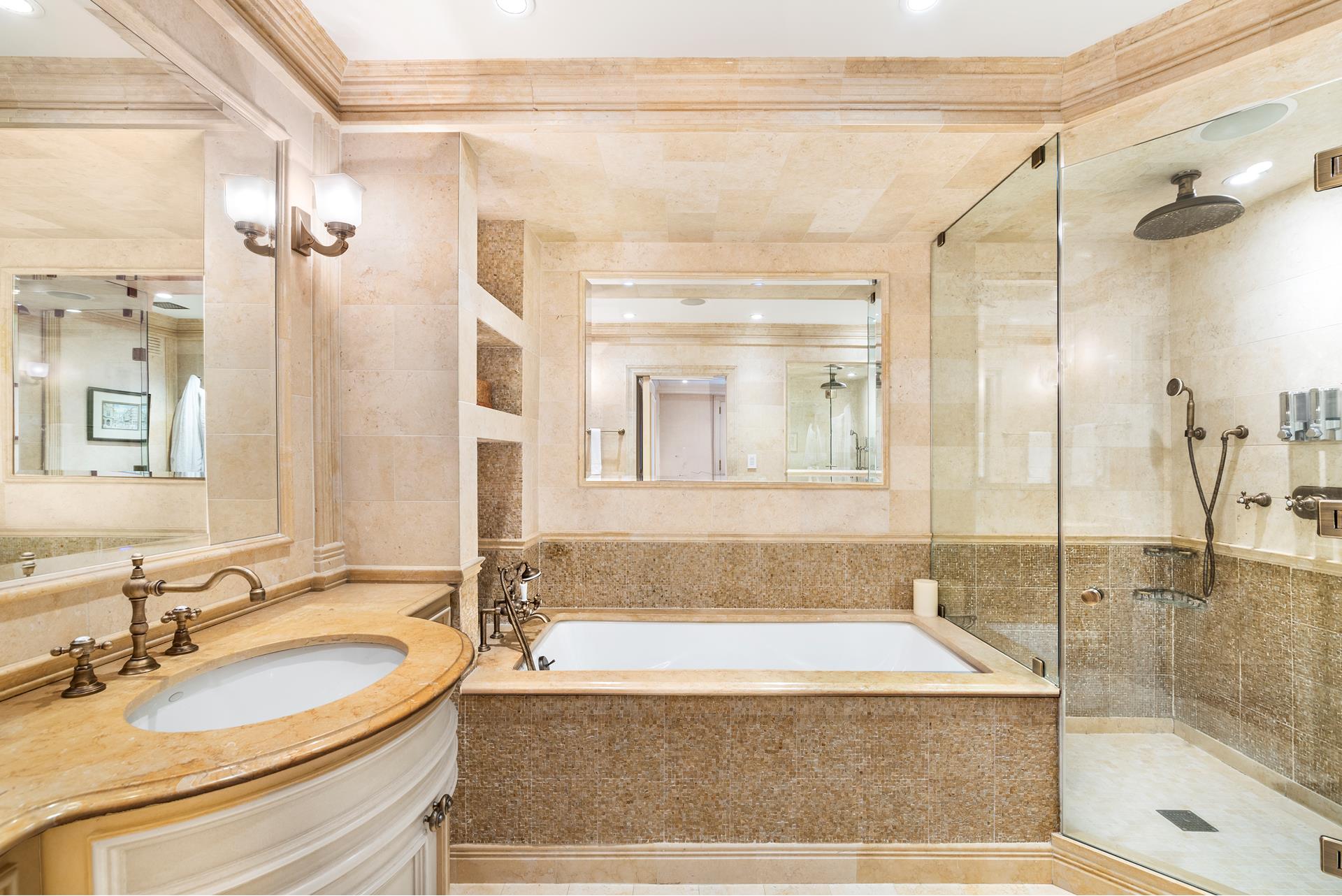 160 Central Park South, Unit 915 Manhattan, NY 10019 - Photo 12 of 18 a bathroom with a granite countertop sink and a mirror