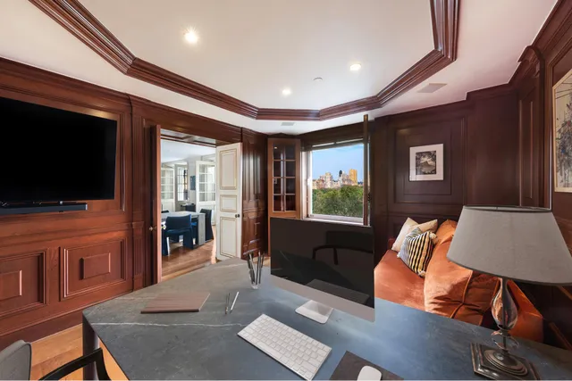 a bedroom with bed and window