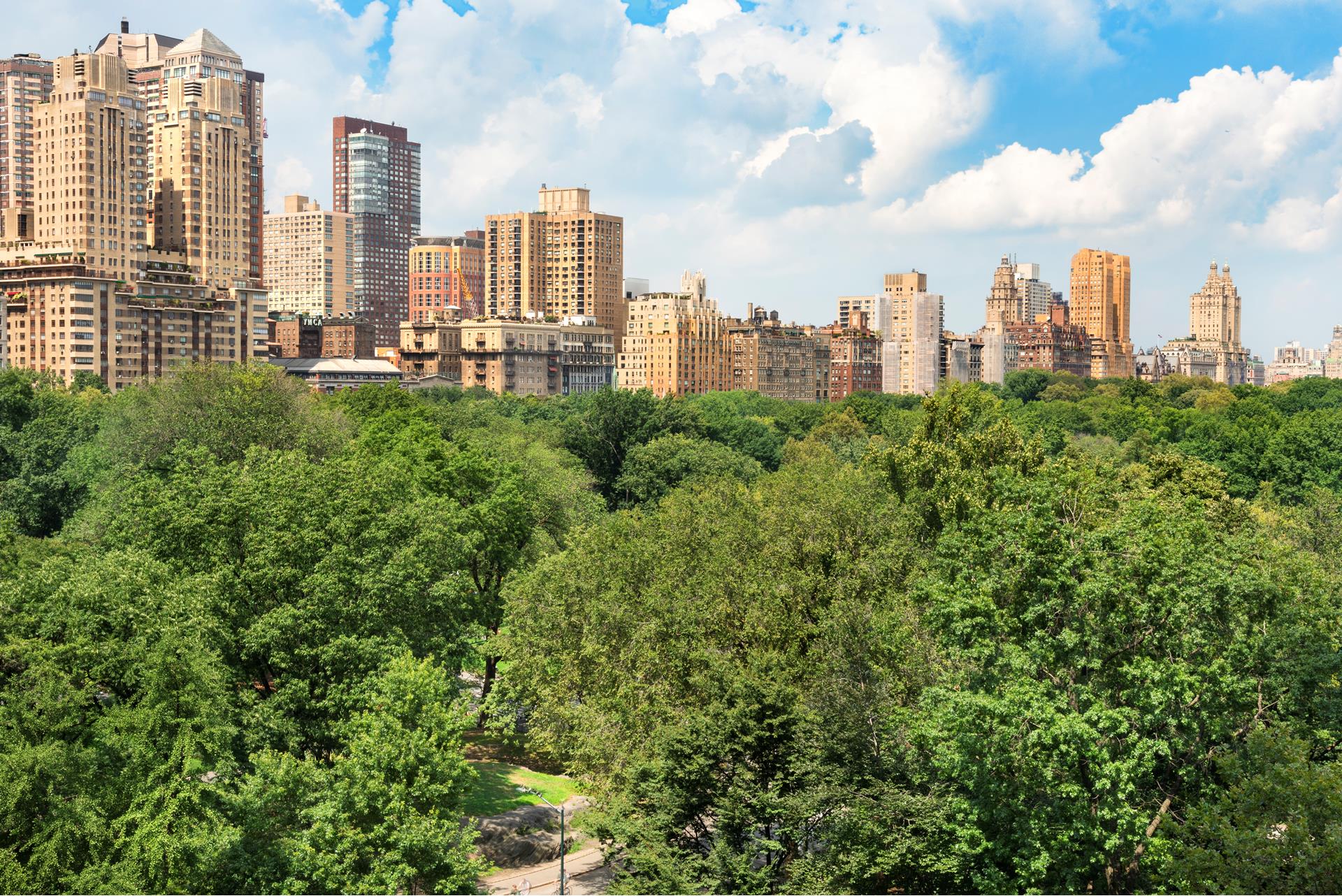 160 Central Park South, Unit 915 Manhattan, NY 10019 - Photo 9 of 18 a view of a city with tall buildings