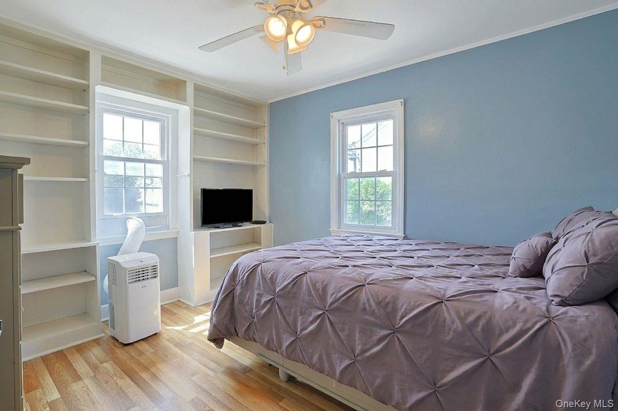 43 John Alden Road New Rochelle, NY 10801 - Photo 18 of 28 a bedroom with a bed and a window