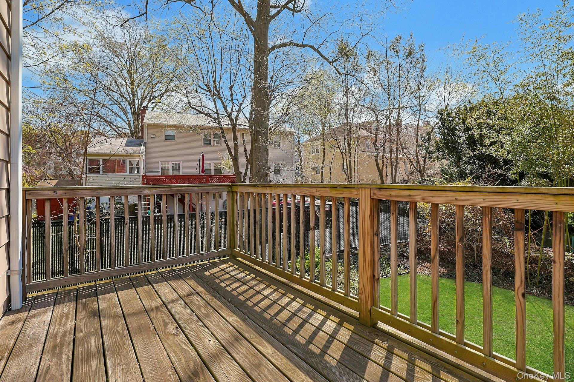 43 John Alden Road New Rochelle, NY 10801 - Photo 21 of 28 a view of a wooden roof deck