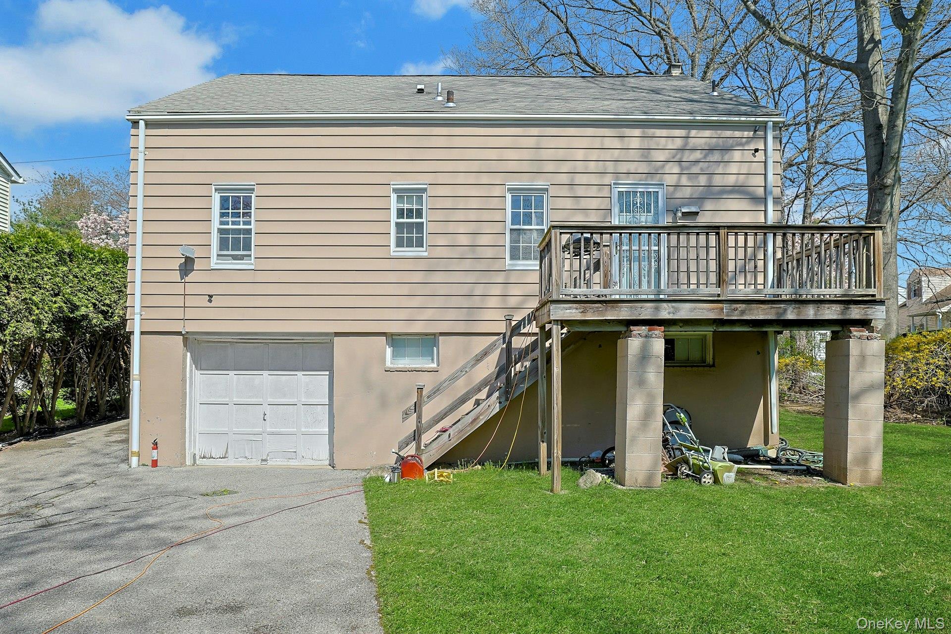 43 John Alden Road New Rochelle, NY 10801 - Photo 23 of 28 a view of a house with a yard