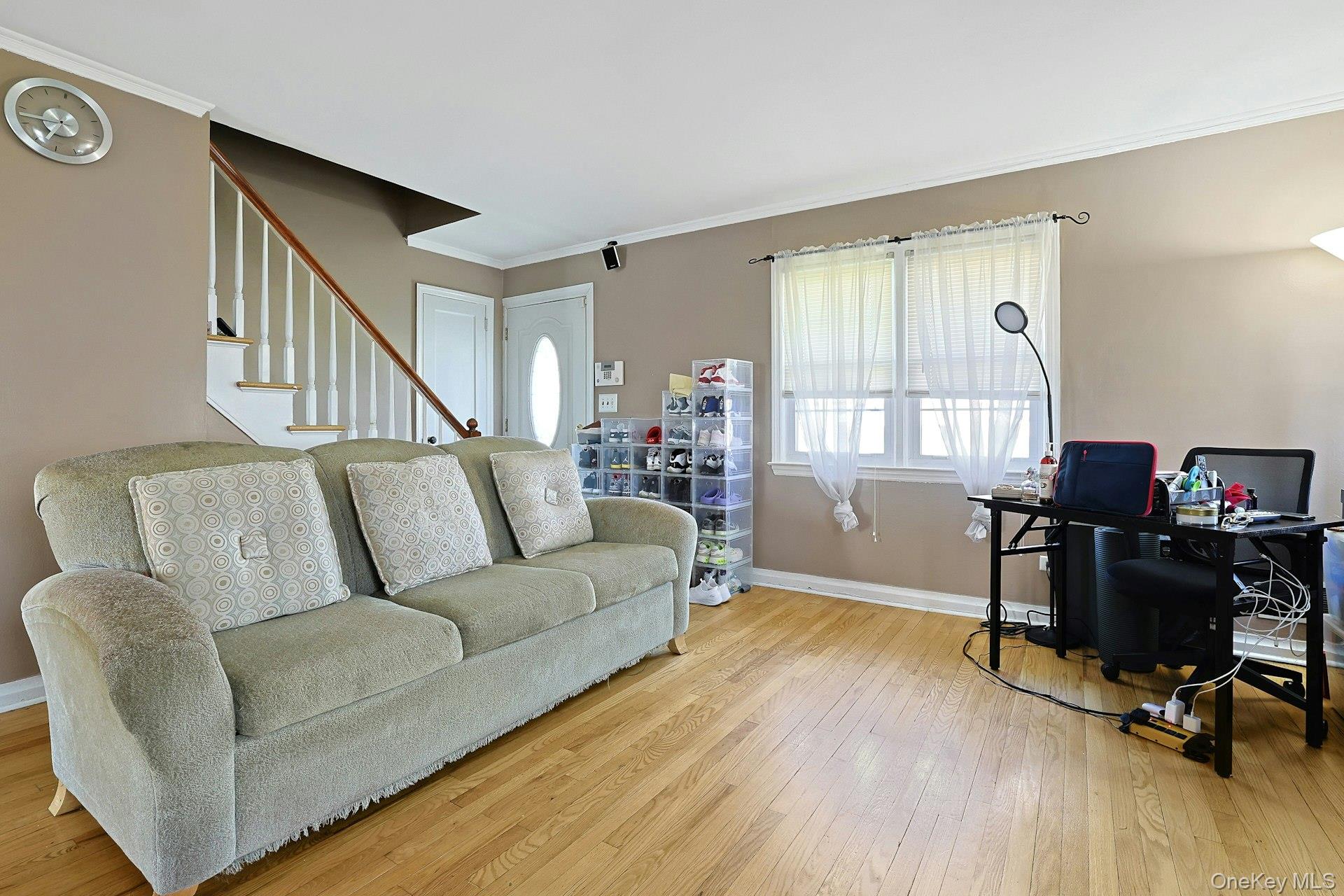 43 John Alden Road New Rochelle, NY 10801 - Photo 5 of 28 a living room with furniture and a wooden floor