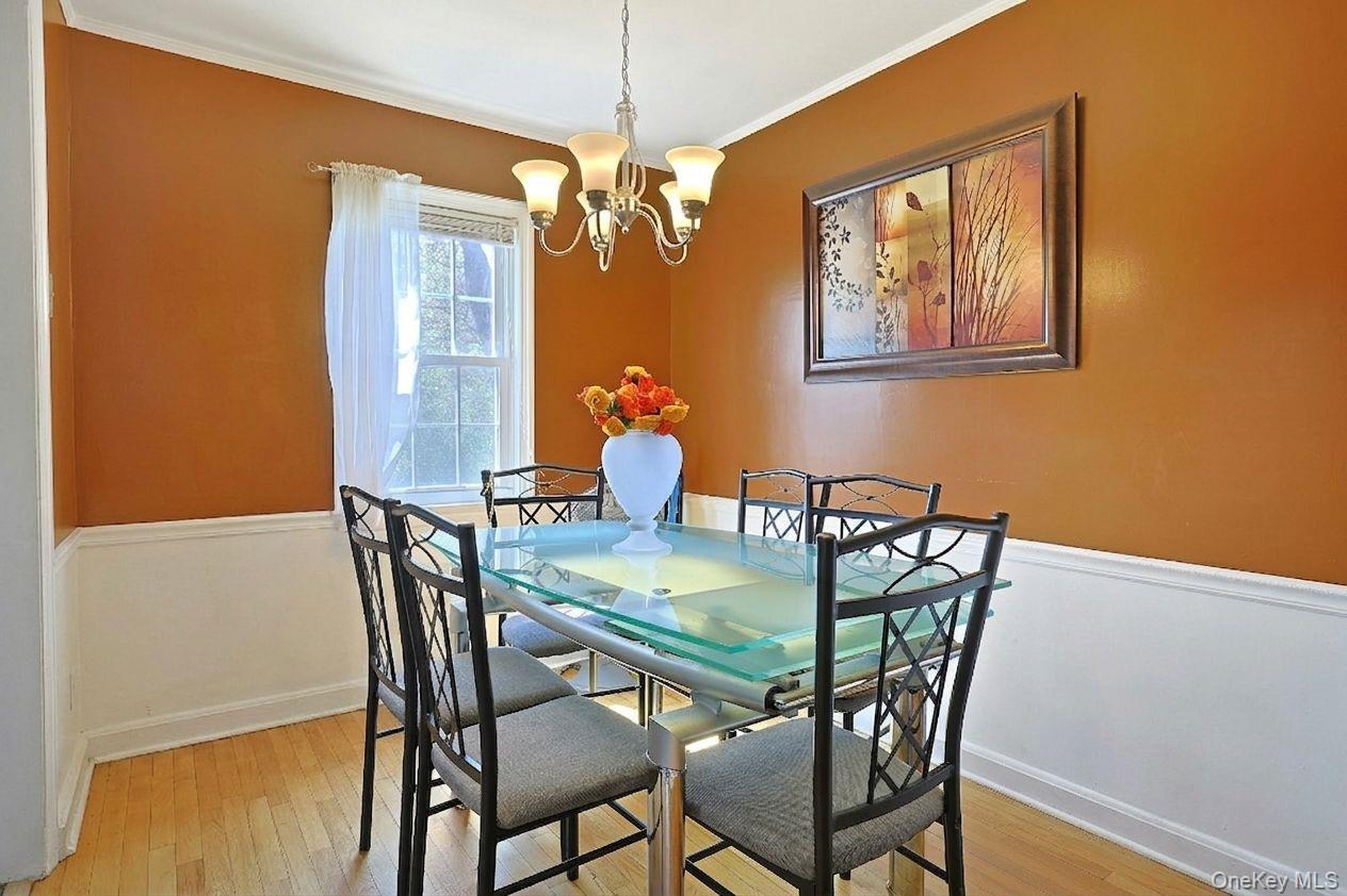 43 John Alden Road New Rochelle, NY 10801 - Photo 10 of 28 a dining room with furniture and window