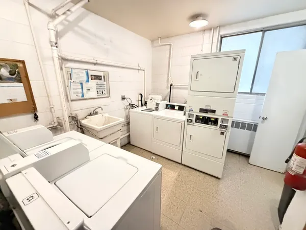 a view of a kitchen with a large window