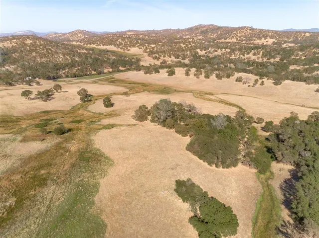 a view of ocean and mountain