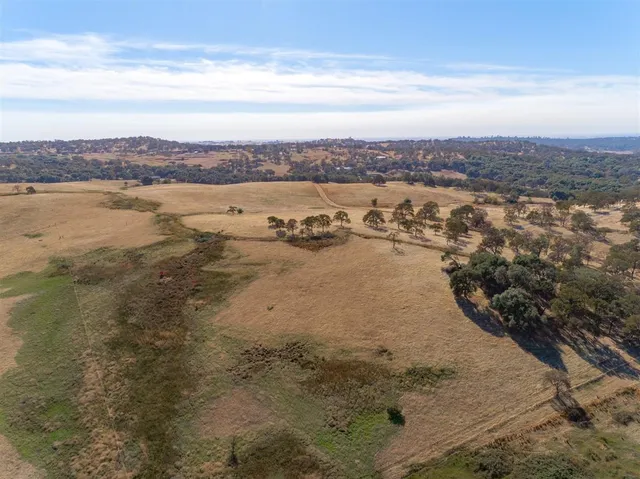 a view of a lake with mountains in the background