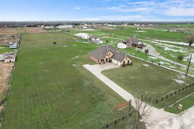 a view of a house with a big yard