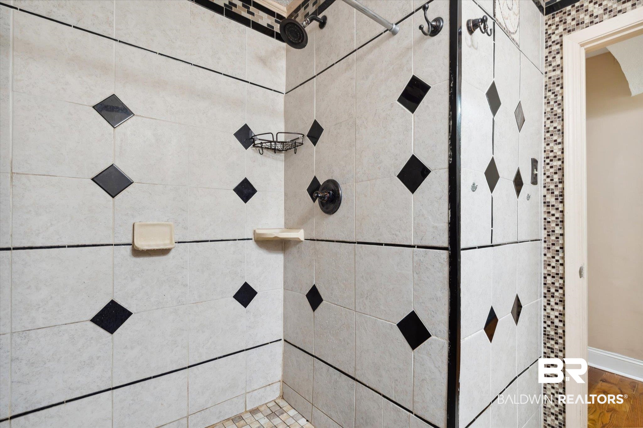 4851 Lesure Road Theodore, AL 36582 - Photo 9 of 21 Bathroom with tiled shower and hardwood / wood-style flooring