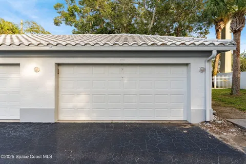 a view of a wooden door and a window