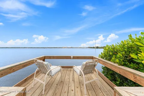 a view of a swimming pool with a lounge chairs