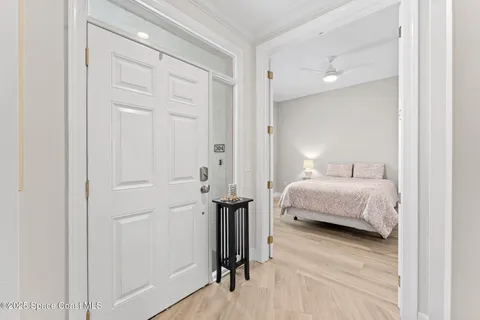 a bedroom with a bed and a walk in closet