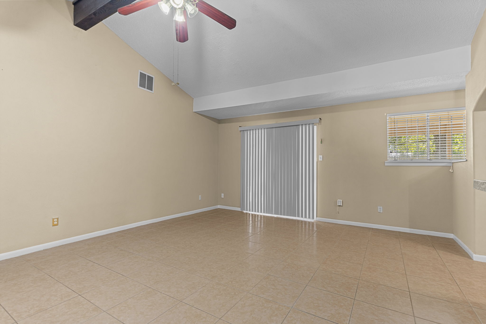 4114 Connorvale Road Houston, TX 77039 - Photo 32 of 41 a view of an empty room with a window