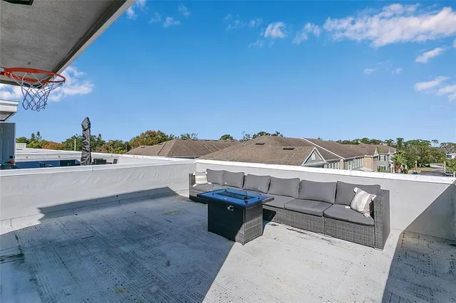 a view of a terrace with chairs