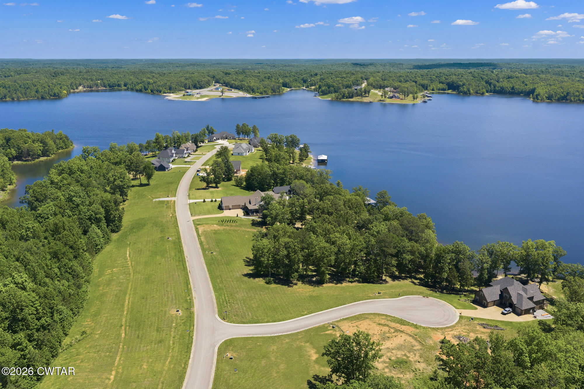 Lot 118 Kyle Road Huntingdon, TN 38344 - Photo 14 of 16 an aerial view of a residential houses with outdoor space and a lake view