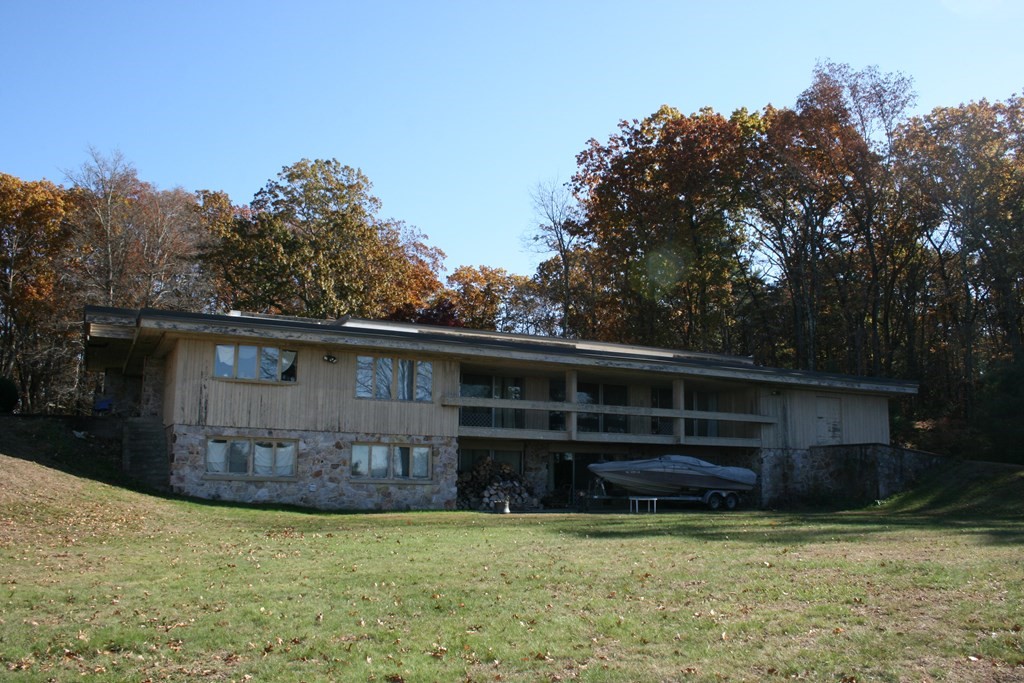 24 Sunset Rock Road Wilbraham, MA 01095 - Photo 16 of 18 a front view of a house with a yard