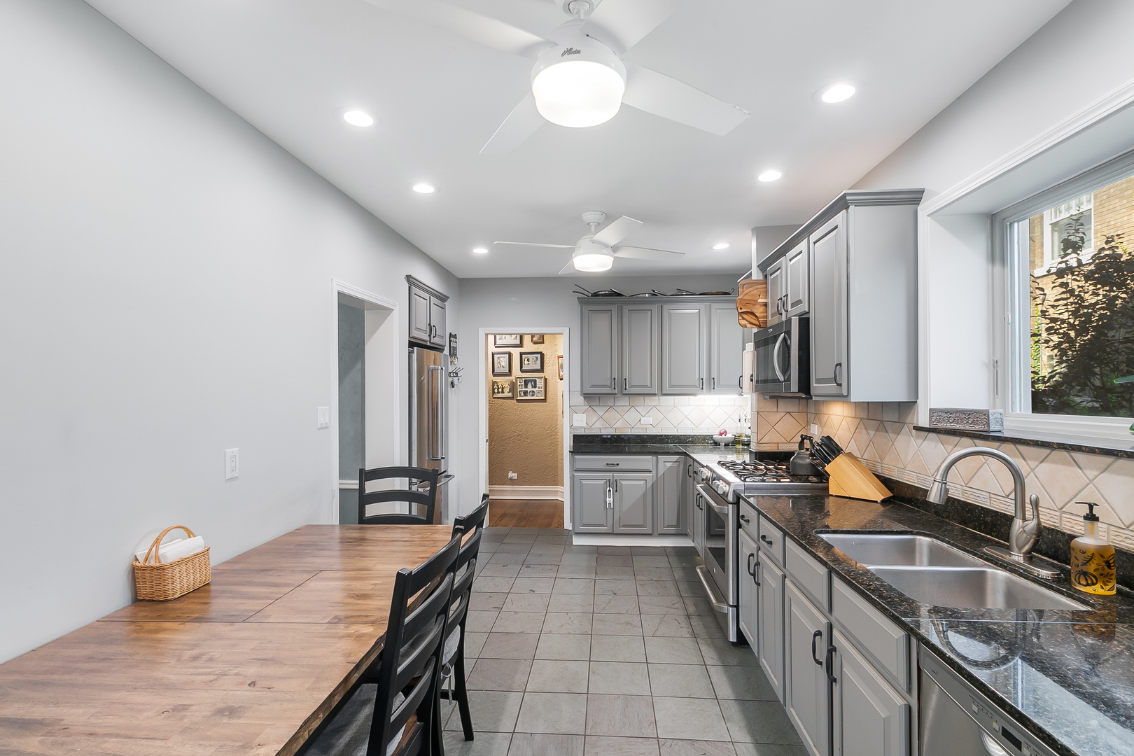 10337 South Hamilton Avenue Chicago, IL 60643 - Photo 9 of 27 a kitchen with stainless steel appliances granite countertop a sink stove and cabinets