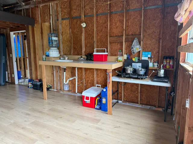 a view of front door with wooden door