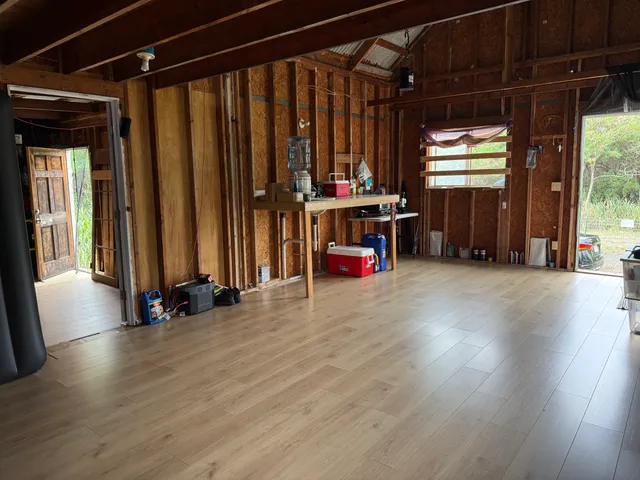 a view of a back yard of the house