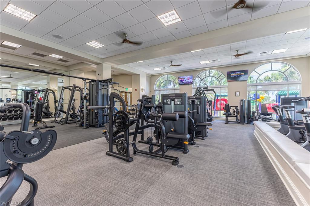 3975 Deer Crossing Court, Unit 102 Naples, FL 34114 - Photo 31 of 32 a view of a room with gym equipment