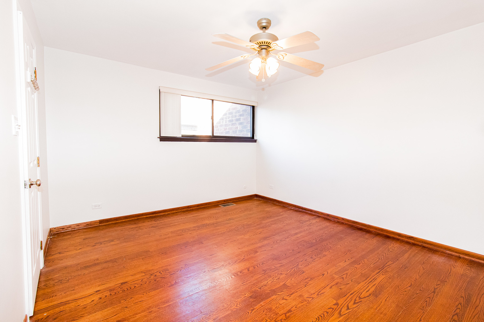 902 South May Street, Unit D Chicago, IL 60607 - Photo 12 of 24 a view of an empty room with a window