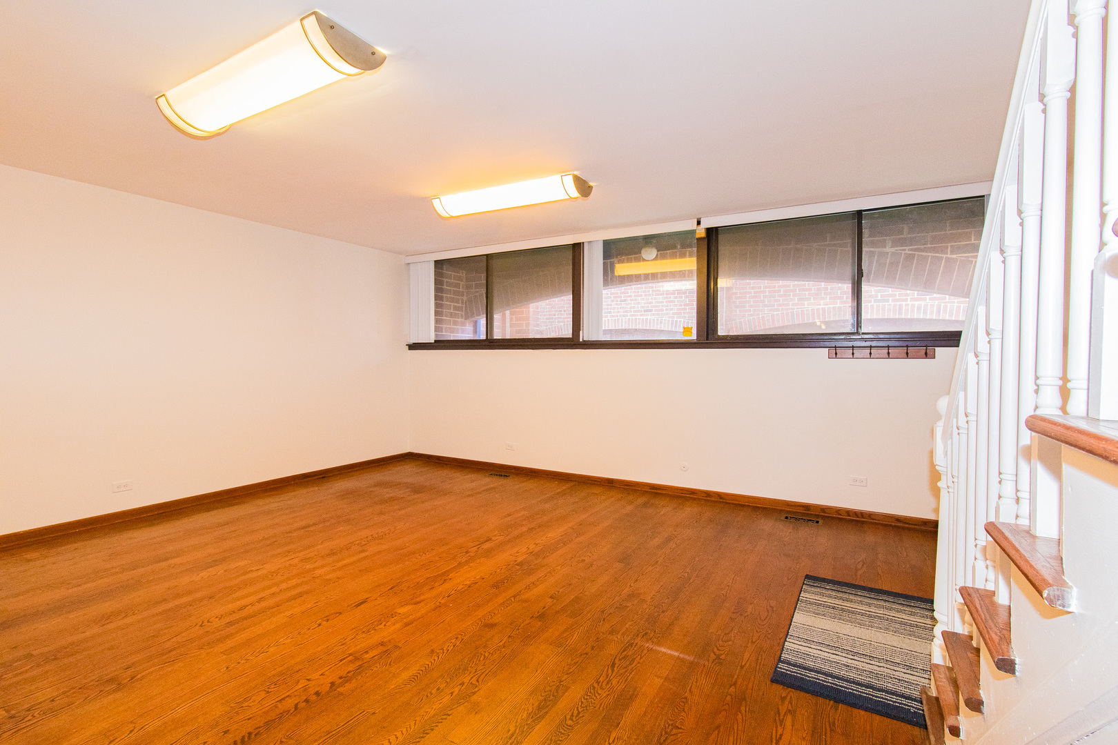 902 South May Street, Unit D Chicago, IL 60607 - Photo 7 of 24 a view of an empty room with a window