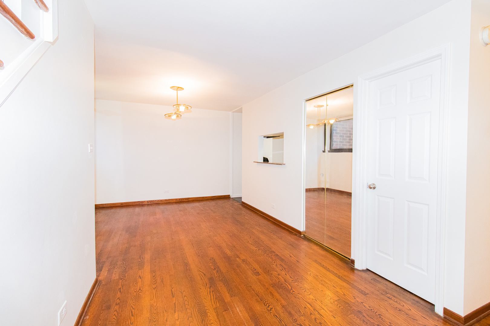 902 South May Street, Unit D Chicago, IL 60607 - Photo 8 of 24 a view of a room with wooden floor