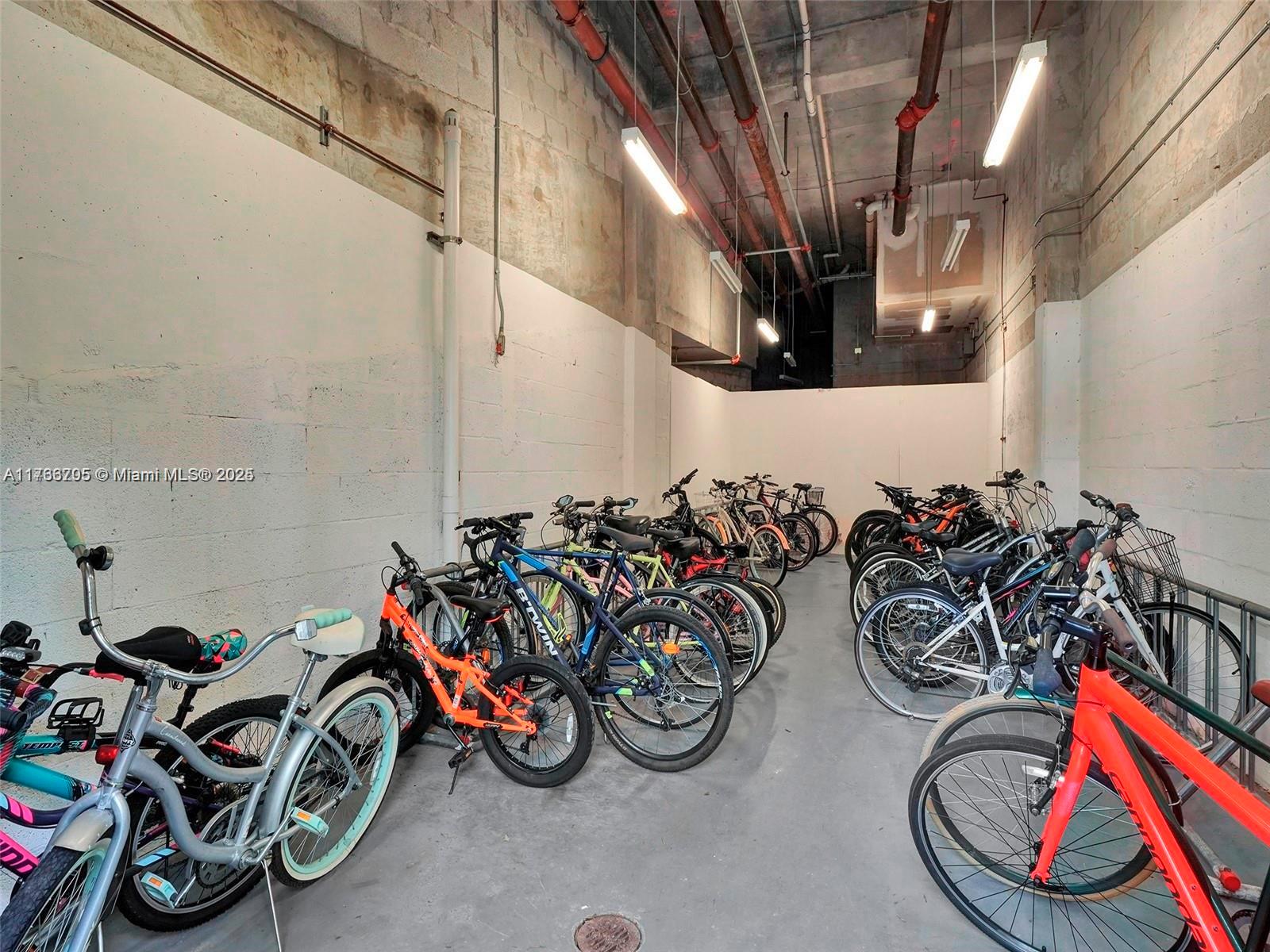 218 Southeast 14th Street, Unit 1203 Miami, FL 33131 - Photo 19 of 22 a view of a bike storage in a garage