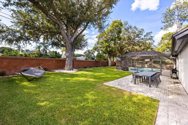 a view of a garden with patio