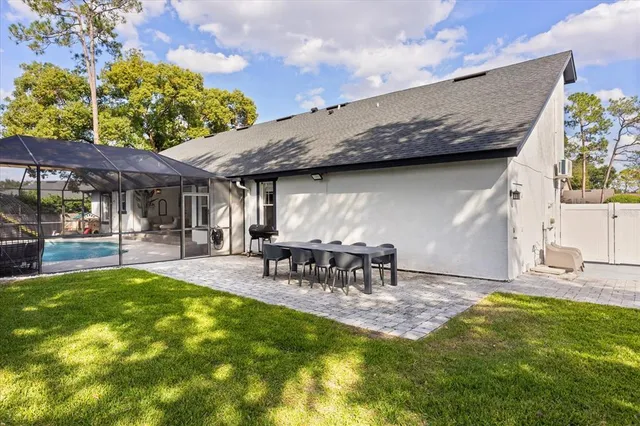 a view of a backyard with a sitting area and seating area