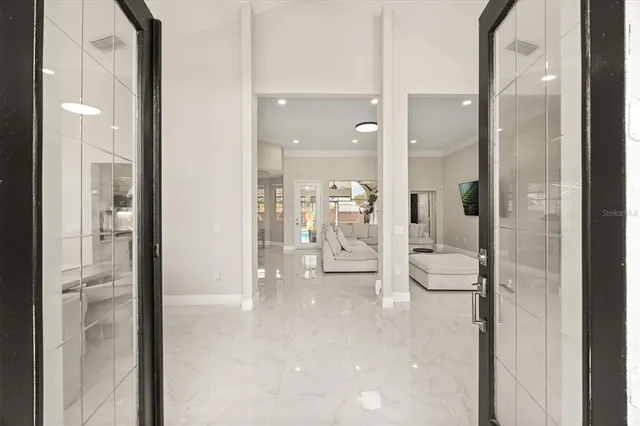 a bathroom with a glass door shower