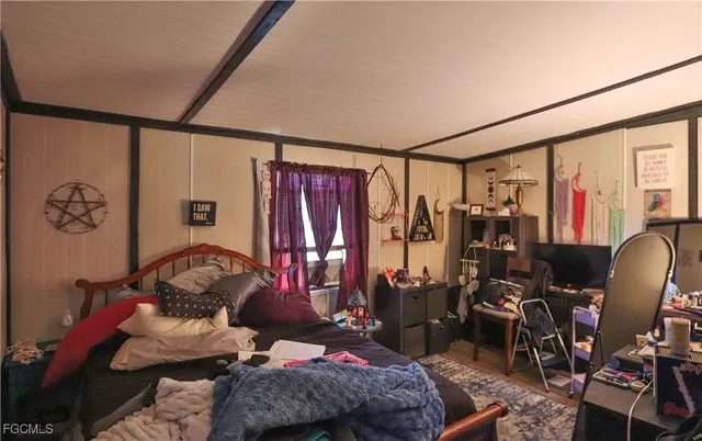 a room with furniture and wooden floor