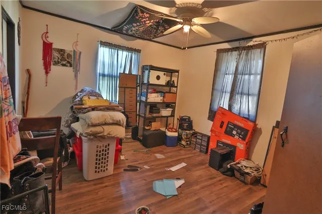 a bathroom with a sink toilet and shower curtain