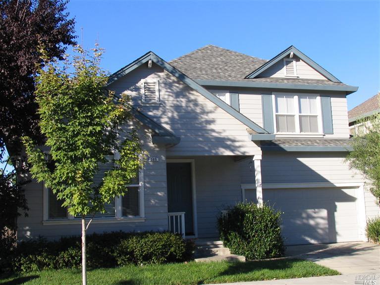 309 Hansbery Way Santa Rosa, CA 95409 - Photo 1 of 1 a front view of a house with a yard