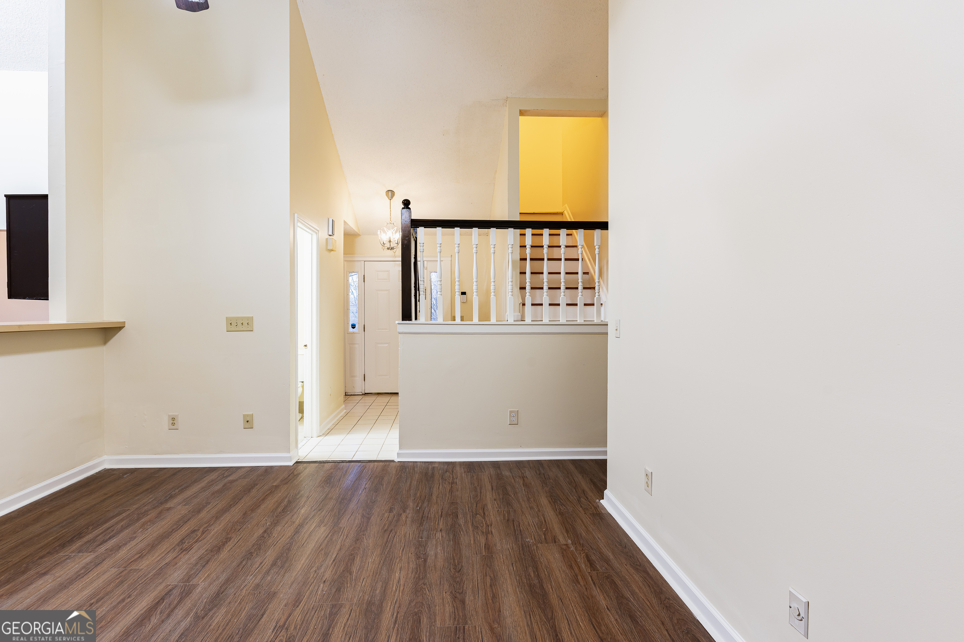 3821 Rex Mill Square Rex, GA 30273 - Photo 17 of 51 an empty room with wooden floor and windows