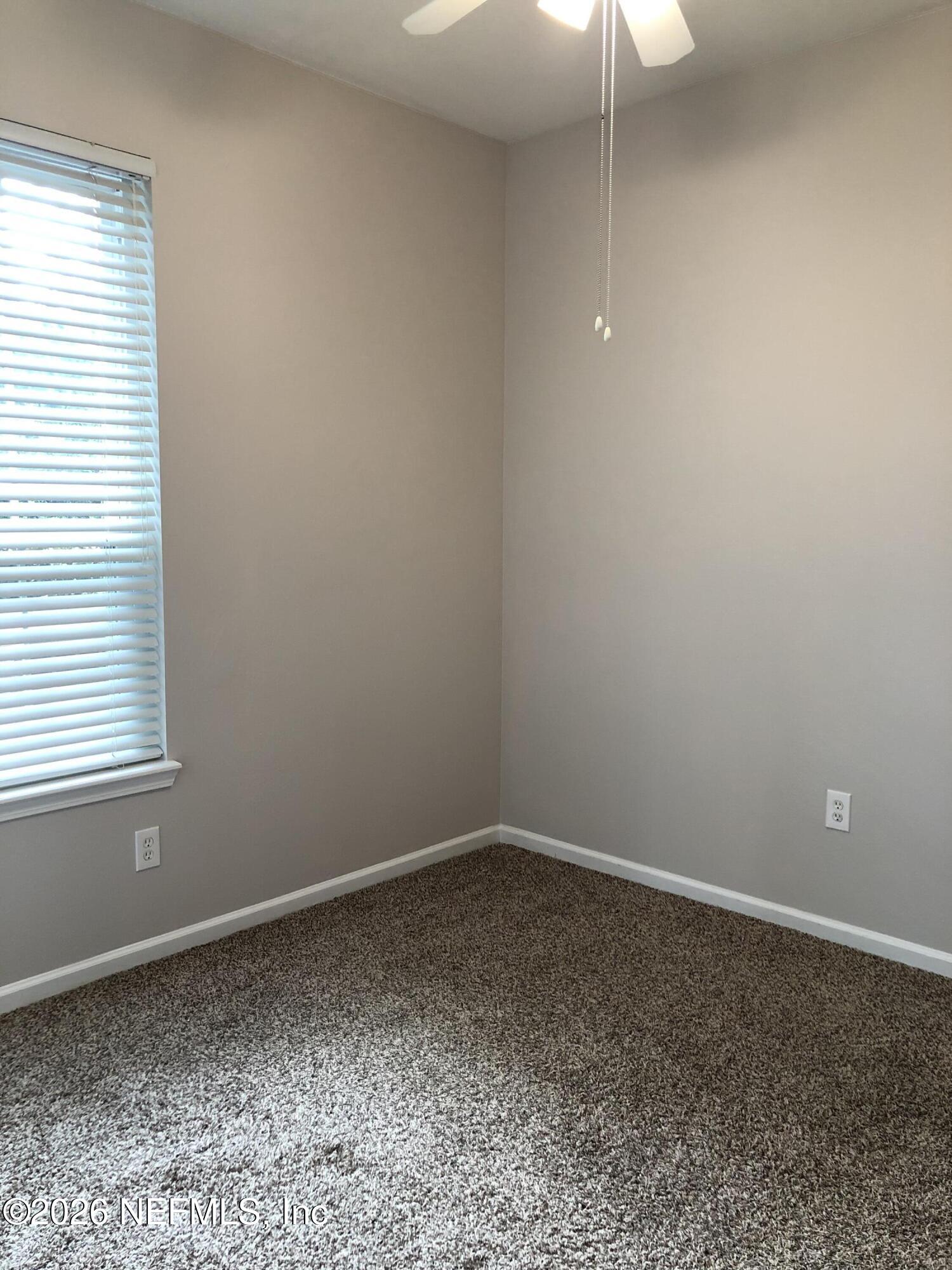 7990 Baymeadows Road, Unit 803 Jacksonville, FL 32256 - Photo 15 of 25 a room that has a window in it
