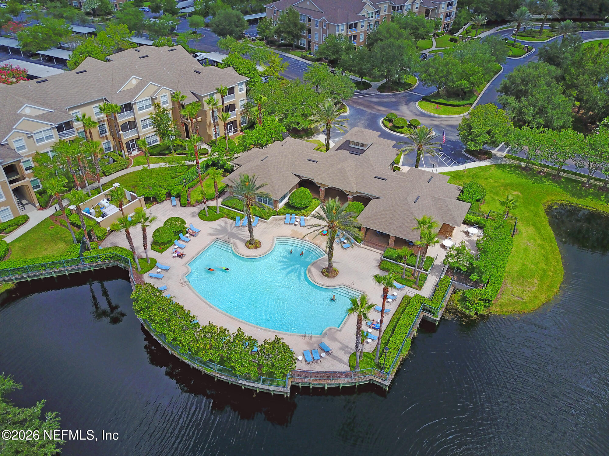 7990 Baymeadows Road, Unit 803 Jacksonville, FL 32256 - Photo 22 of 25 an aerial view of a house with a garden and swimming pool
