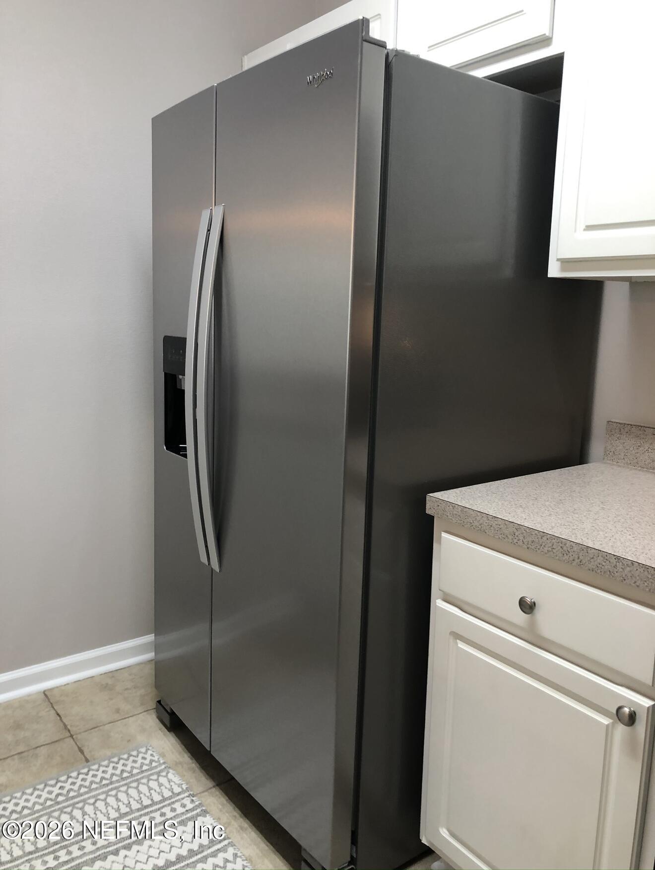 7990 Baymeadows Road, Unit 803 Jacksonville, FL 32256 - Photo 9 of 25 a close view of a closet and utility room
