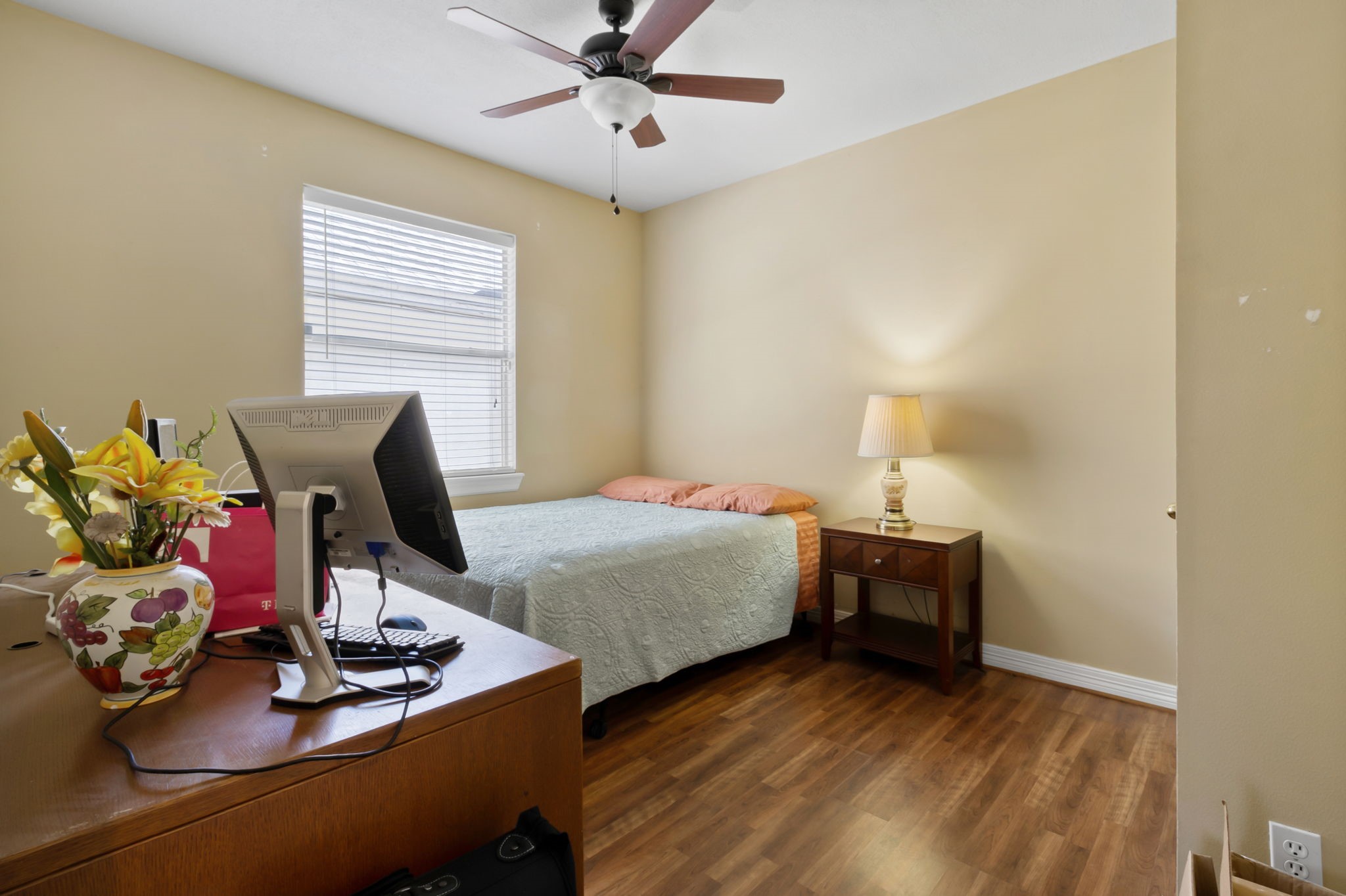 18106 Briden Oak Court Spring, TX 77379 - Photo 20 of 31 a bedroom with bed and a window